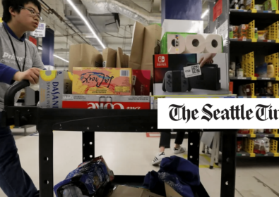 Man working at a warehouse. The Seattle Times.