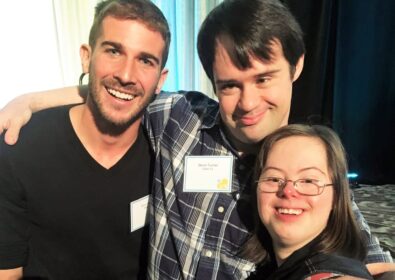 Three people posing for a photo