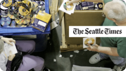 People sorting out CDs. The Seattle Times.